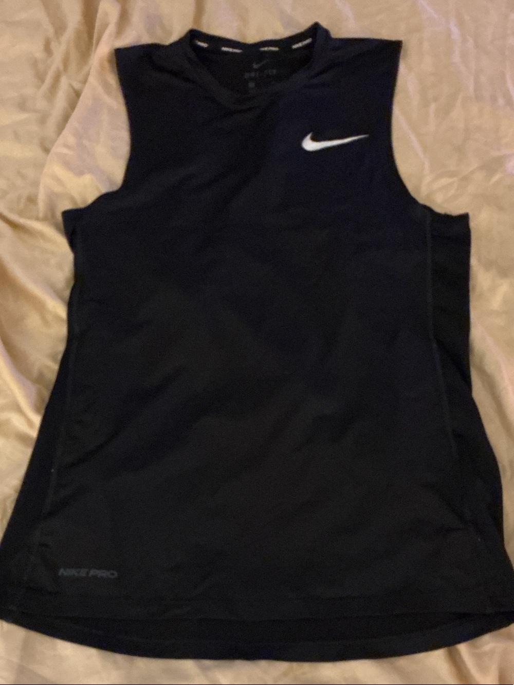 Nike Black Sleeveless men’s Tank with White Swoosh Logo